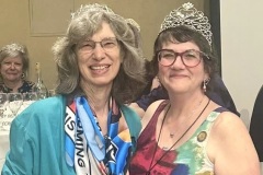 Suzanne Heron, Governor of the WCR  2021 - 2024, proudly accepted her owl pin from Governor Chari Grant